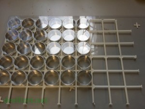 6 modules joined together to form a 9x6 grid for 54 mini petri dishes.